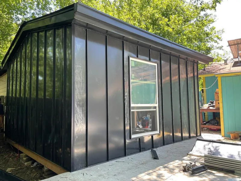 Black standing seam metal wall panels for Roof Inspection in Eloy