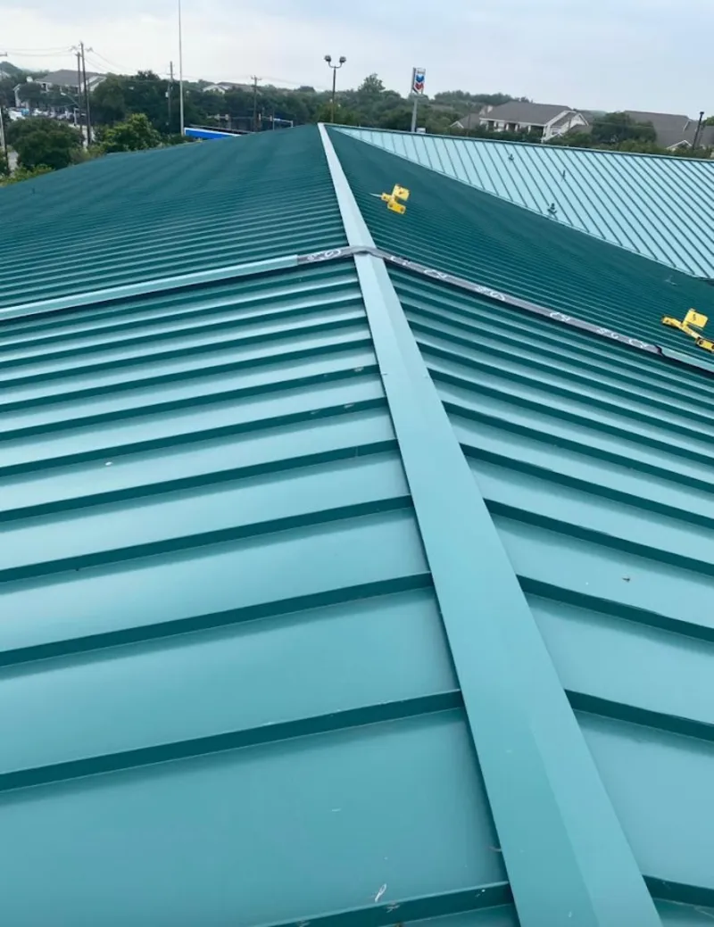 Green commercial metal roof ridge and valley for Metal Roof Repair in Eloy